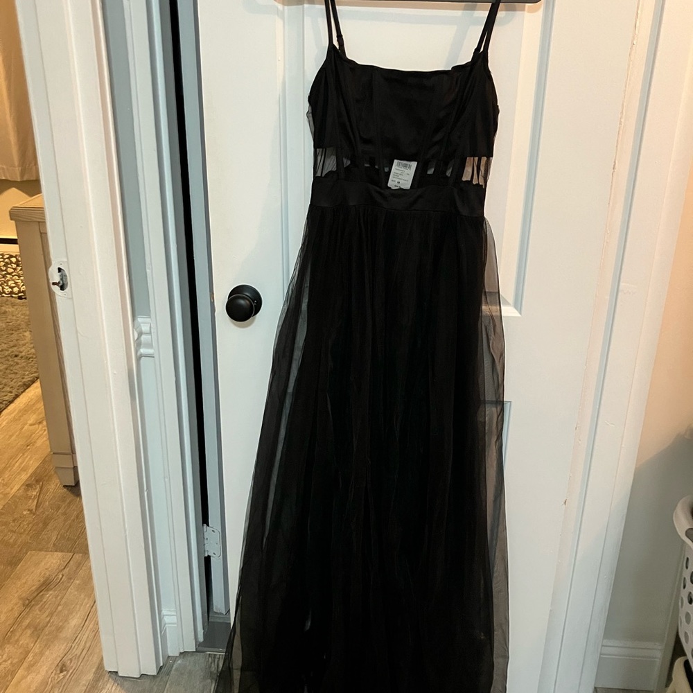 Windsor brand. Black floor length prom dress with netted overlay. NWT -medium